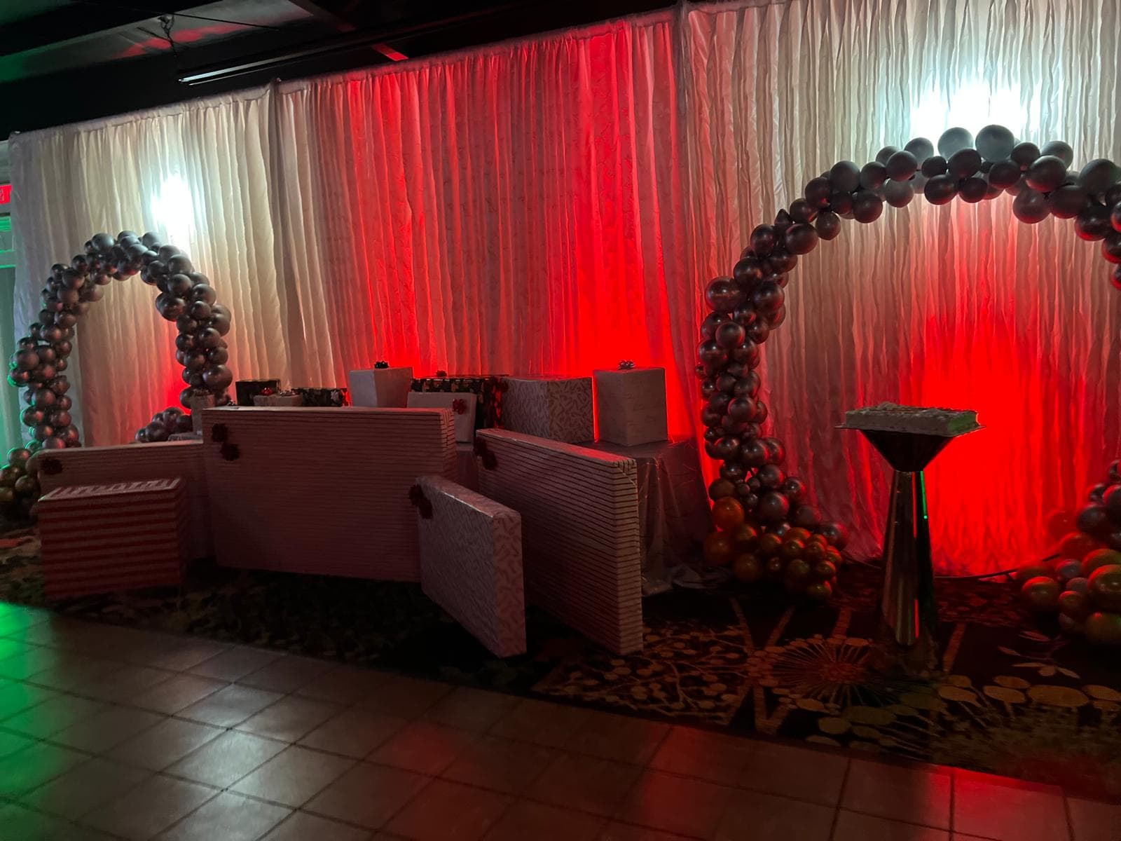Backdrop and balloon arches